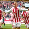 1. FC Köln Secures Crucial Win Against Short-Handed Bremen in Relegation Showdown