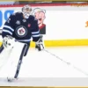 NHL Rumors: Erik Haula’s Future and Connor Hellebuyck’s Speculation